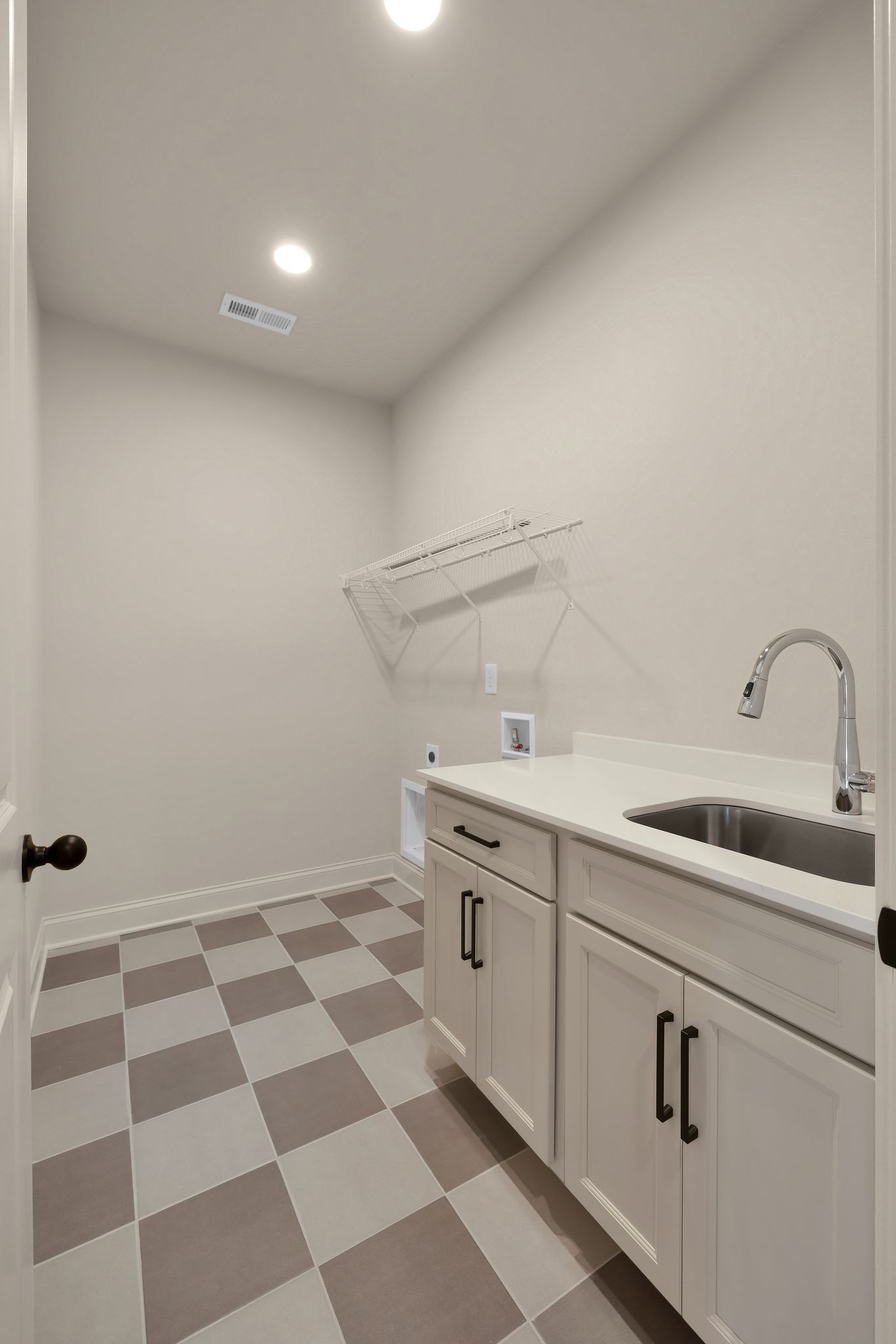 7321 Winners Road Murfreesboro, TN 37129 - Photo 20 of 41 a kitchen with a sink a refrigerator and cabinets