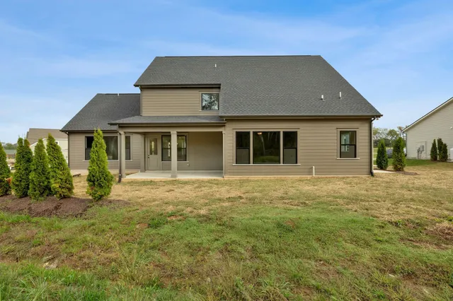 front view of a house with a yard