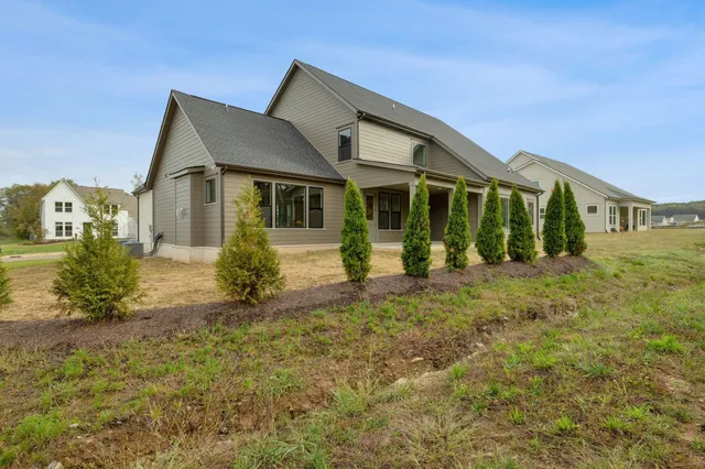 front view of a house with a yard
