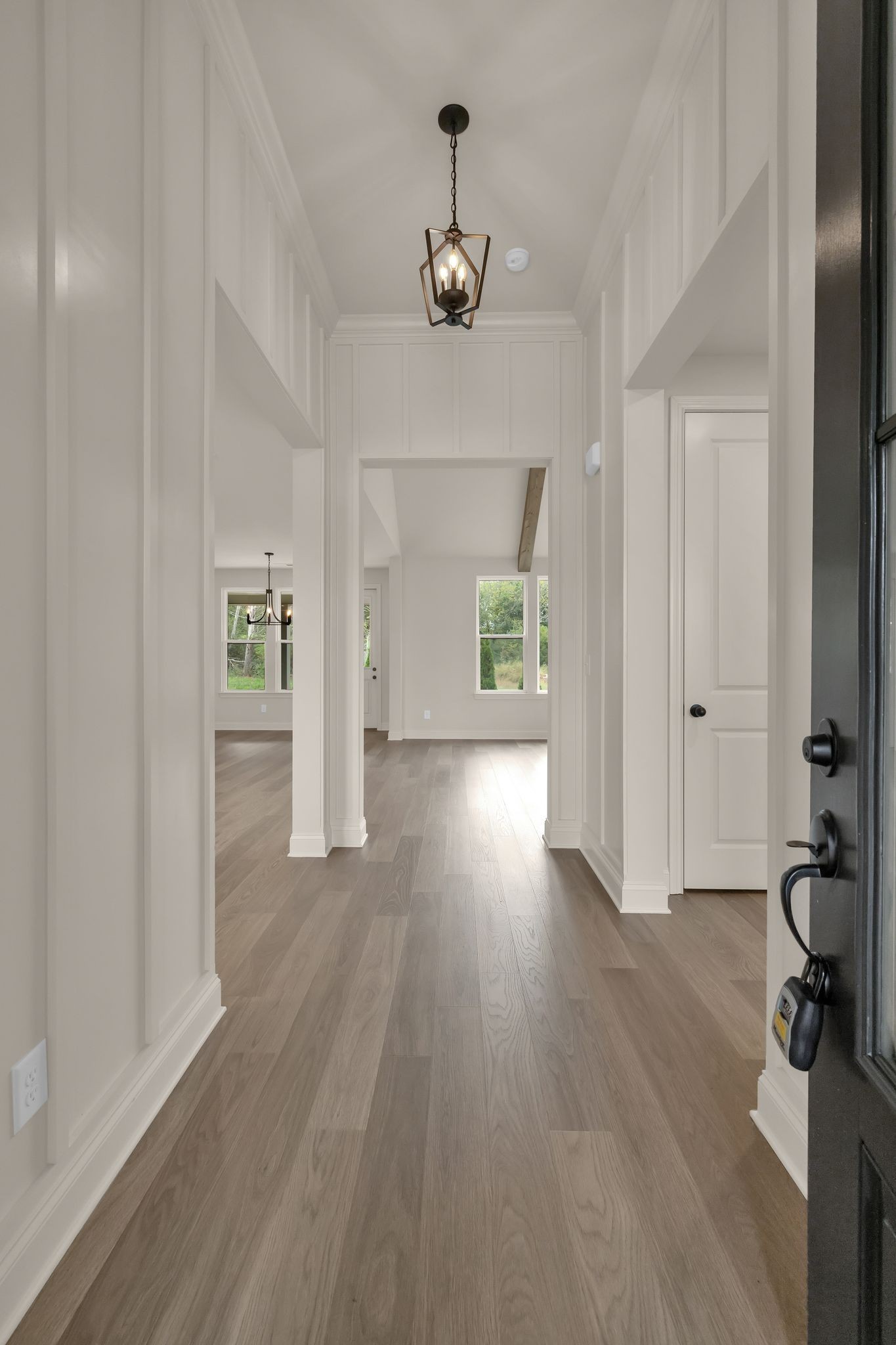 7321 Winners Road Murfreesboro, TN 37129 - Photo 6 of 41 wooden floor in an empty room with a window