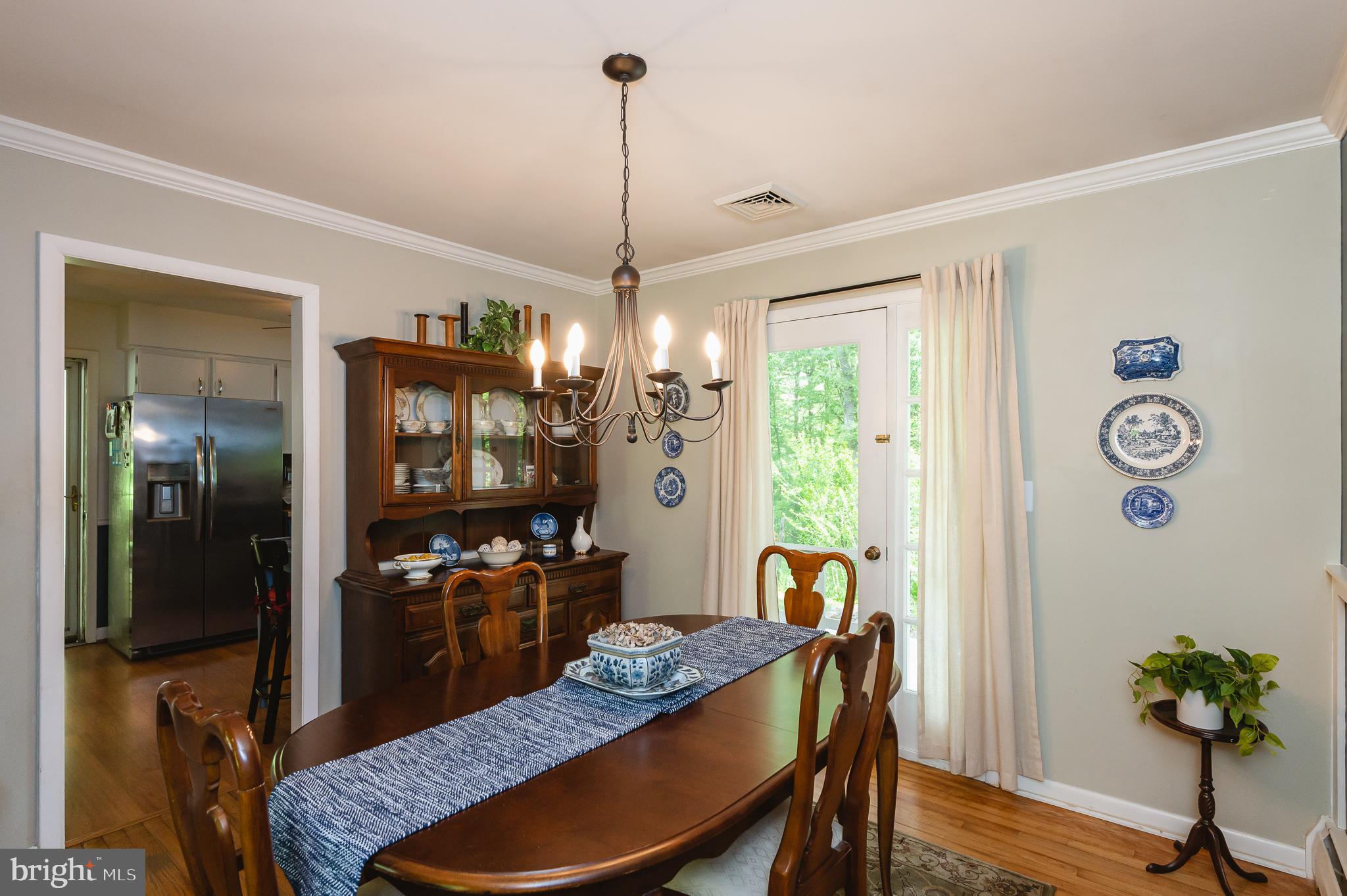 3911 Longmoor Circle Phoenix, MD 21131 - Photo 11 of 64 Dining Room access to patio