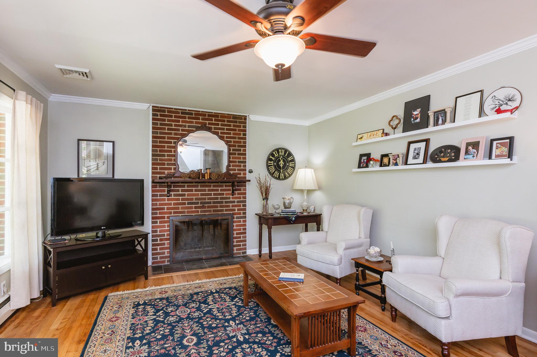 3911 Longmoor Circle Phoenix, MD 21131 - Photo 6 of 64 Living Room w/ wood burning fireplace