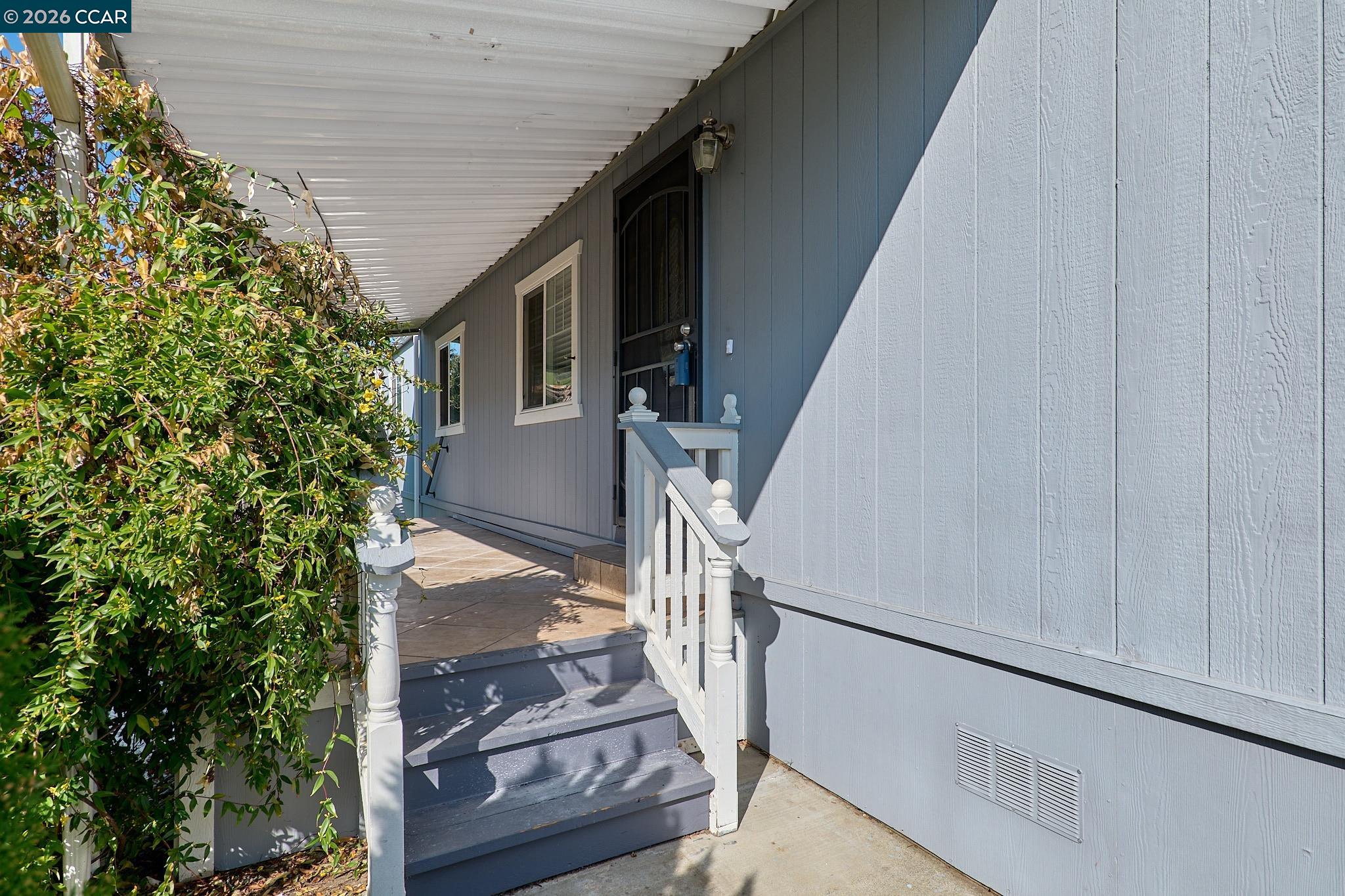 16711 Marsh Creek Road, Unit 112 Clayton, CA 94517 - Photo 2 of 27 a view of entryway with wooden floor
