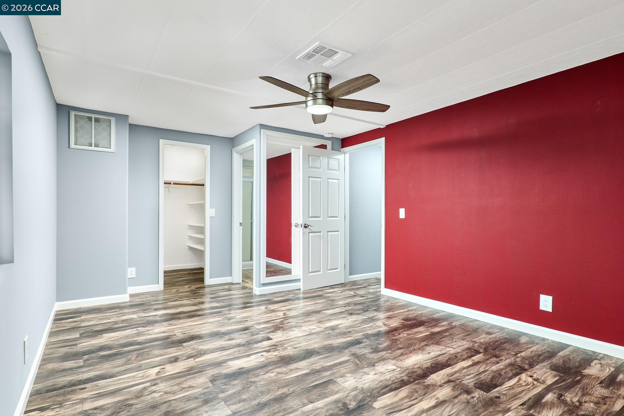 16711 Marsh Creek Road, Unit 112 Clayton, CA 94517 - Photo 21 of 27 a view of a livingroom with a ceiling fan and window