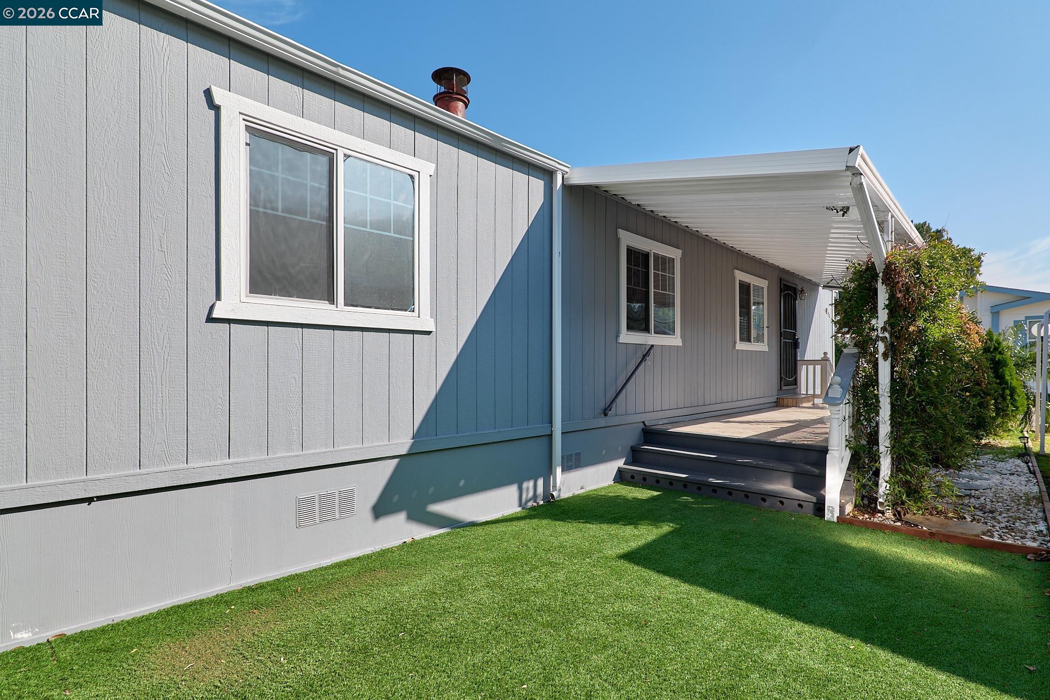 16711 Marsh Creek Road, Unit 112 Clayton, CA 94517 - Photo 25 of 27 a view of an house with backyard space and porch