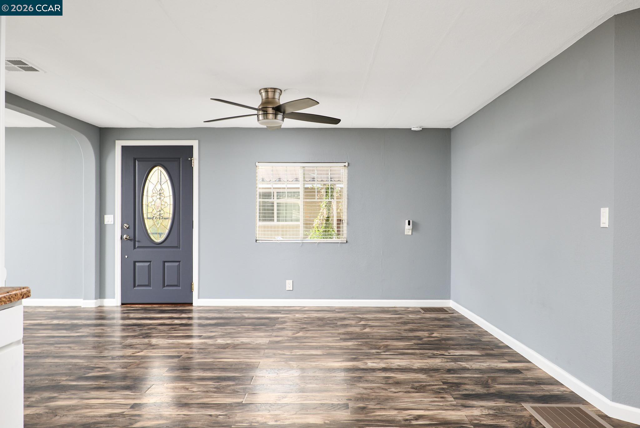 16711 Marsh Creek Road, Unit 112 Clayton, CA 94517 - Photo 5 of 27 a view of a livingroom with wooden floor