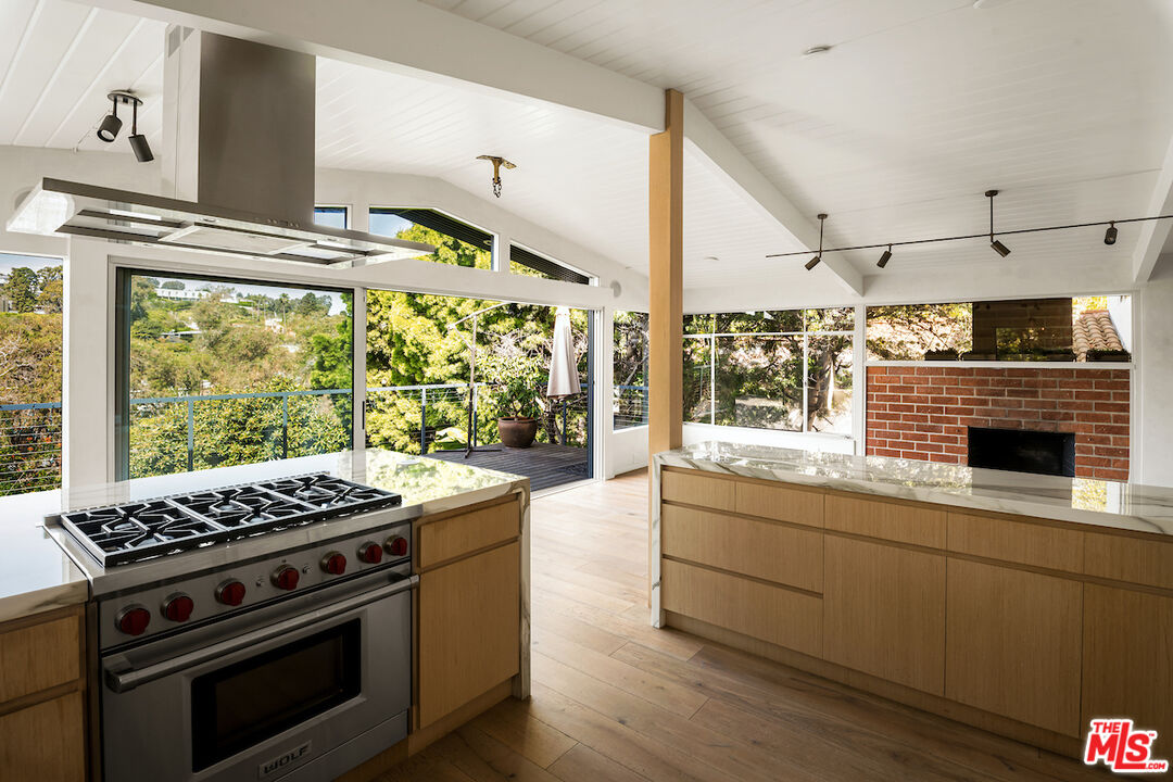 295 Mabery Road Santa Monica, CA 90402 - Photo 14 of 49 a kitchen with granite countertop a stove and a sink