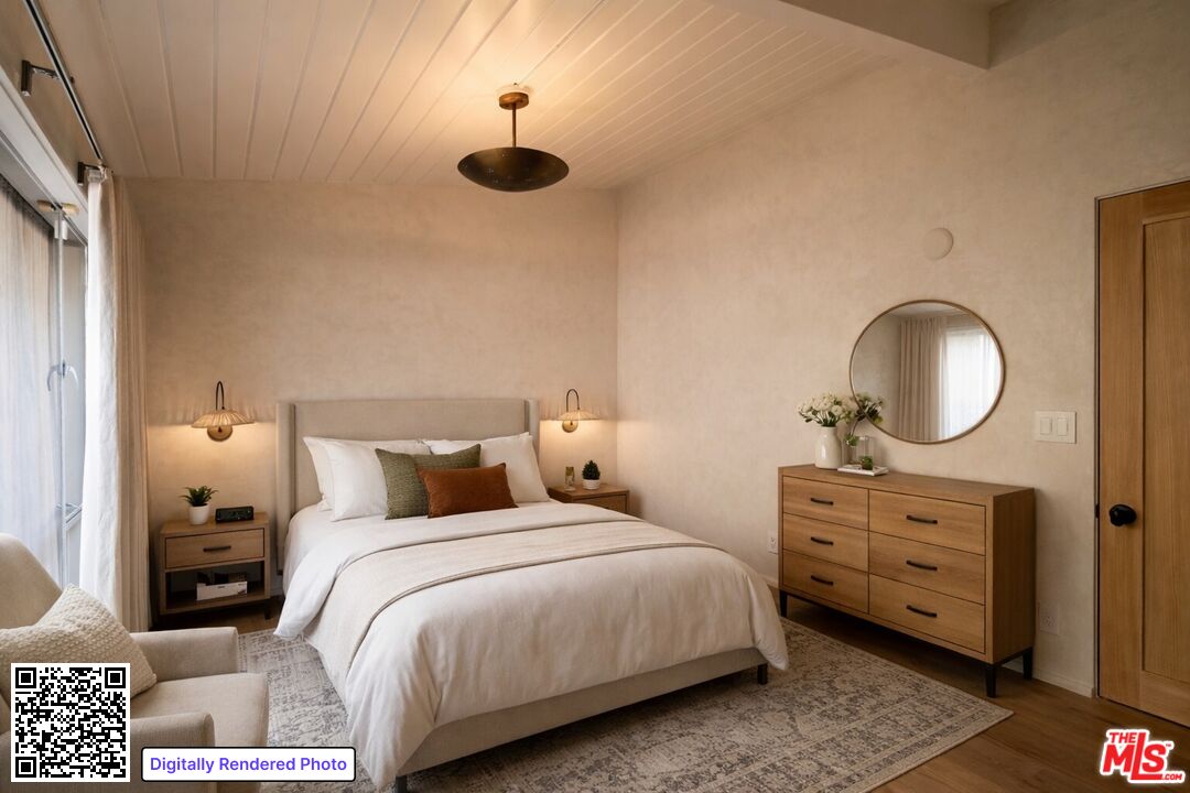 295 Mabery Road Santa Monica, CA 90402 - Photo 22 of 49 a bedroom with a bed and wooden floor