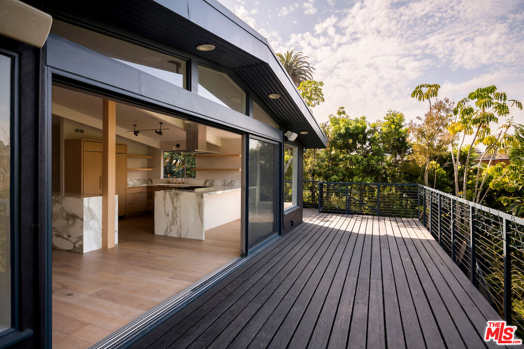 295 Mabery Road Santa Monica, CA 90402 - Photo 38 of 49 a view of a balcony with wooden floor and fence