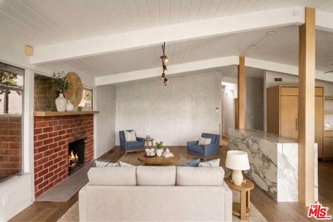 295 Mabery Road Santa Monica, CA 90402 - Photo 10 of 49 a living room with furniture and a fireplace
