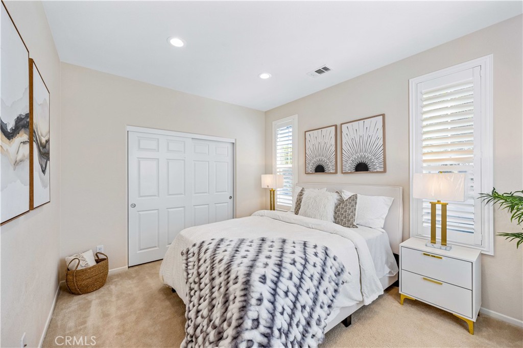 130 Prospect Irvine, CA 92618 - Photo 12 of 35 a bedroom with a bed and a window