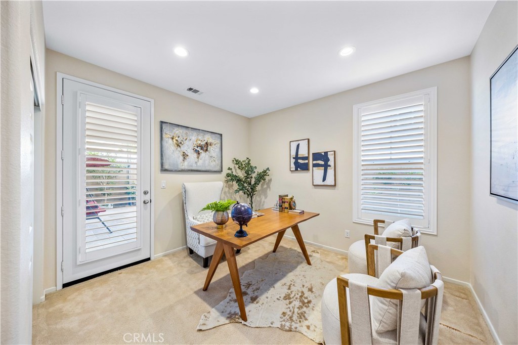 130 Prospect Irvine, CA 92618 - Photo 15 of 35 a living room with furniture and a window