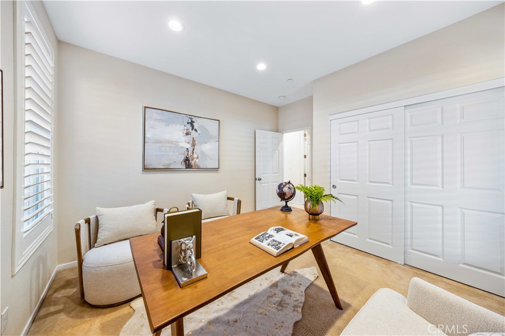 130 Prospect Irvine, CA 92618 - Photo 16 of 35 a living room with furniture and wooden floor