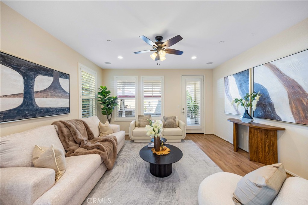 130 Prospect Irvine, CA 92618 - Photo 5 of 35 a living room with furniture and a large window