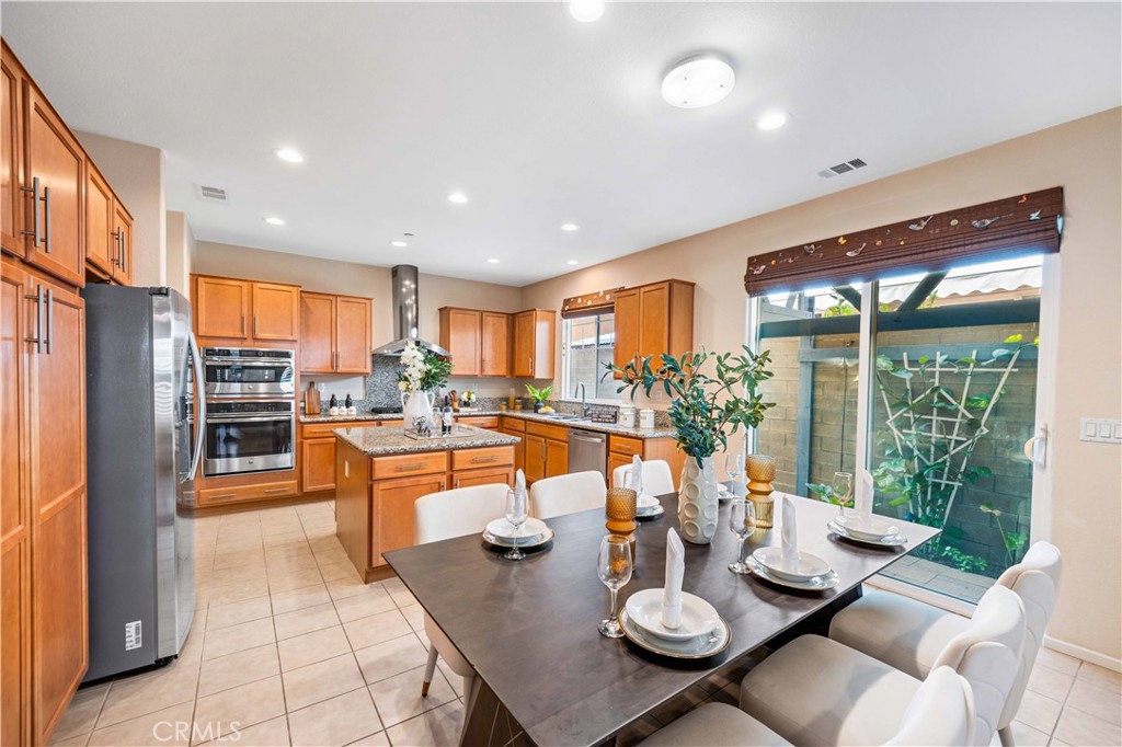 130 Prospect Irvine, CA 92618 - Photo 7 of 35 a outdoor dining space with furniture and a large window