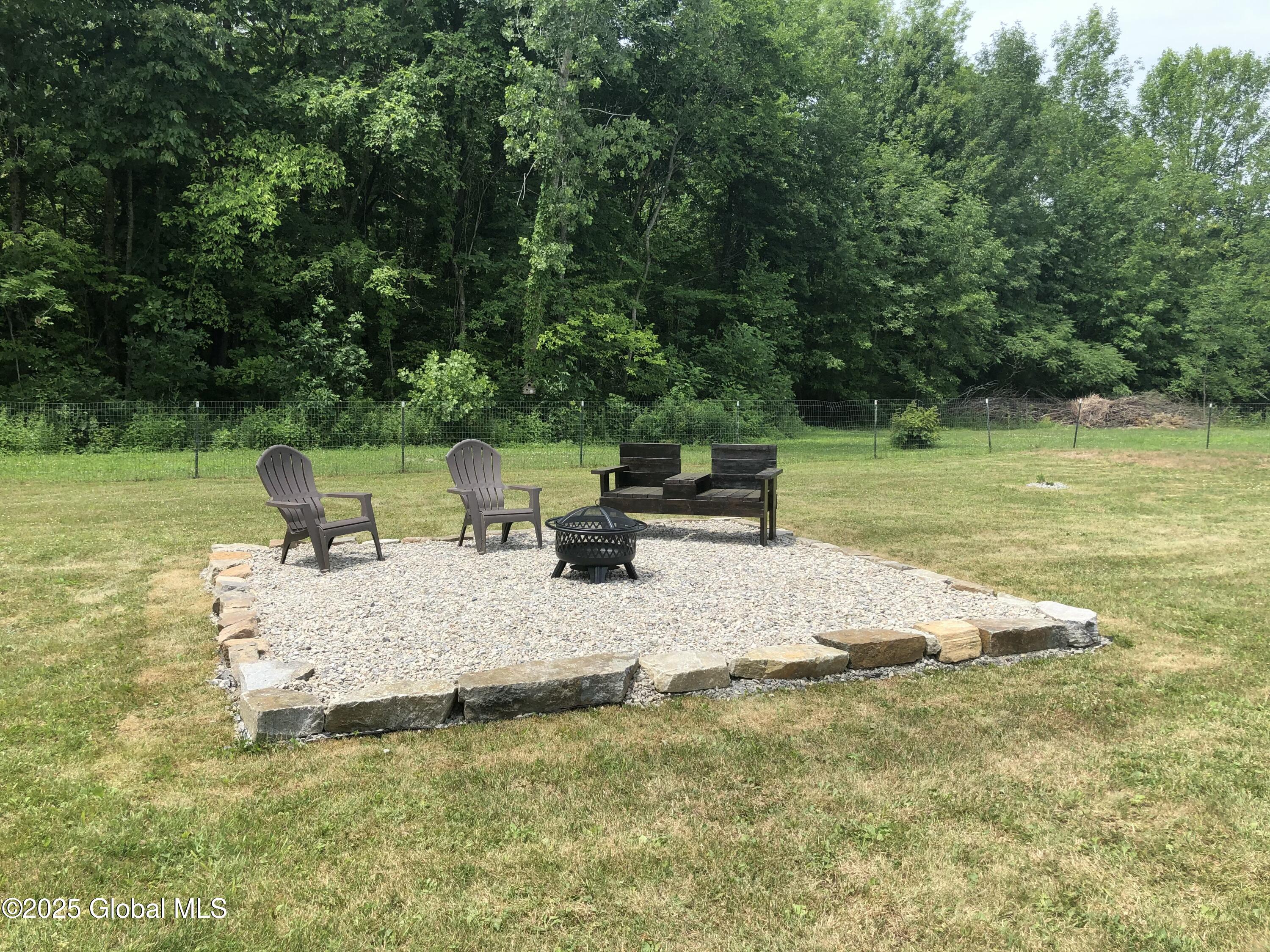117 Hartman Road Hudson Falls, NY 12839 - Photo 24 of 49 Stone fire pit area