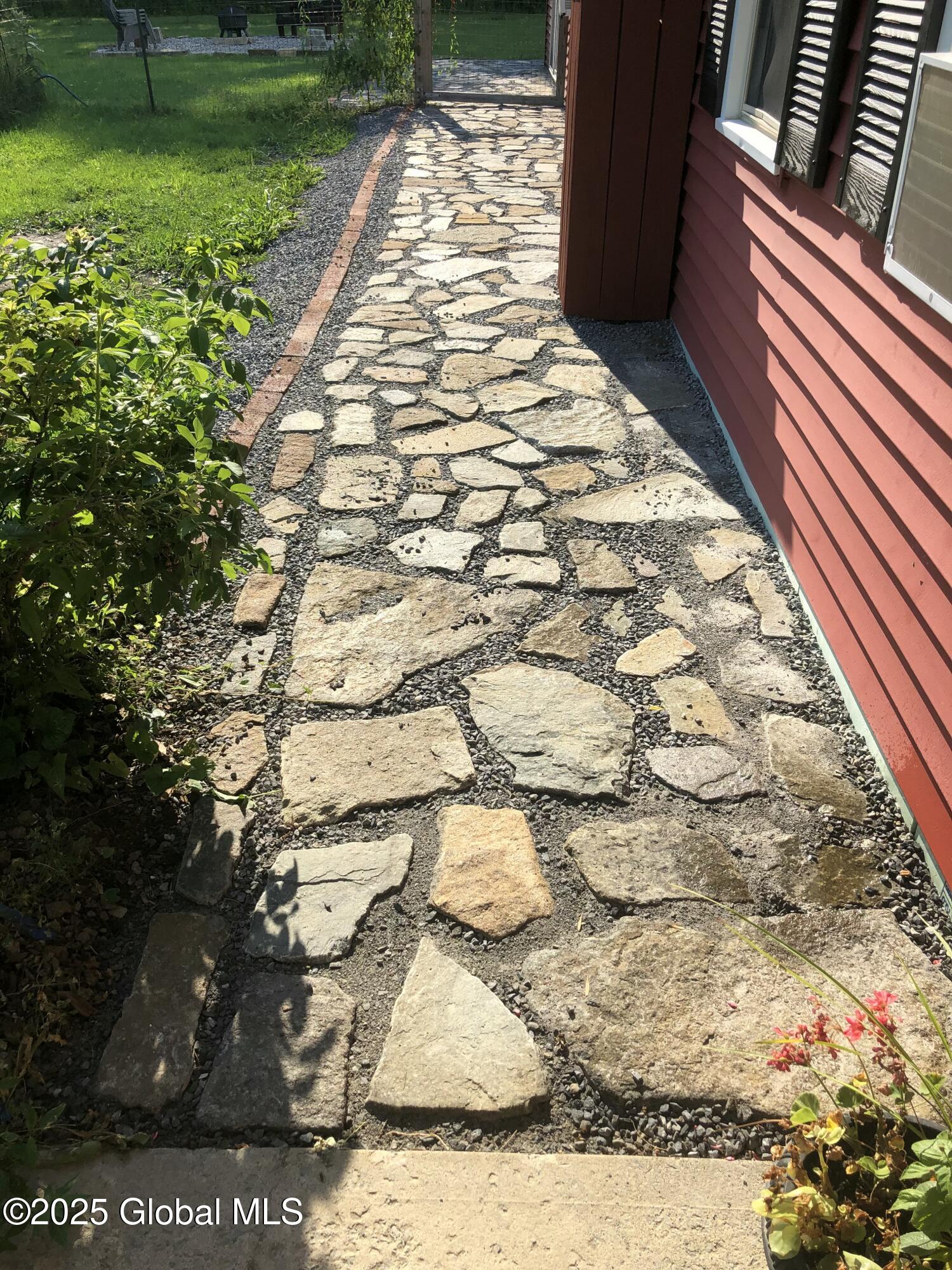 117 Hartman Road Hudson Falls, NY 12839 - Photo 25 of 49 Stone sidewalk to the back yard