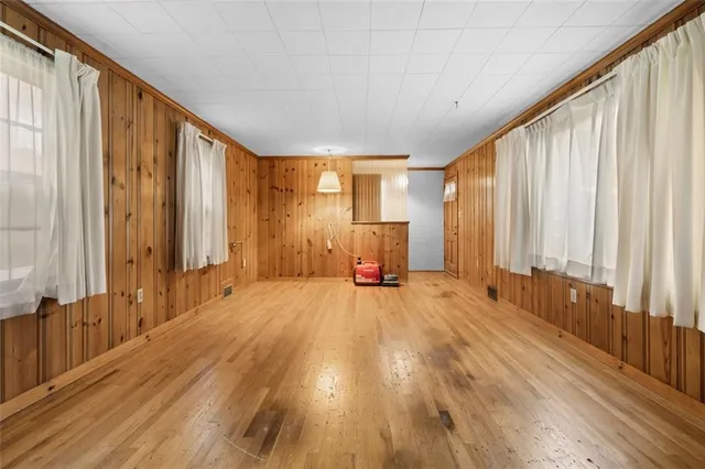 wooden floor and windows in an empty room