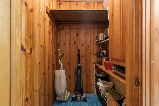 a view of an entryway with wooden door