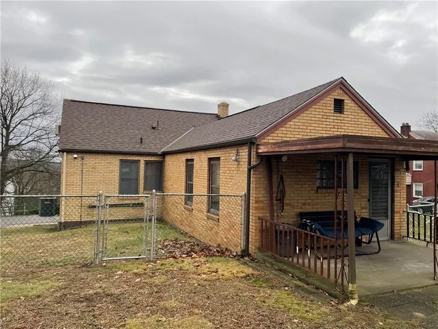 a view of house with outdoor space