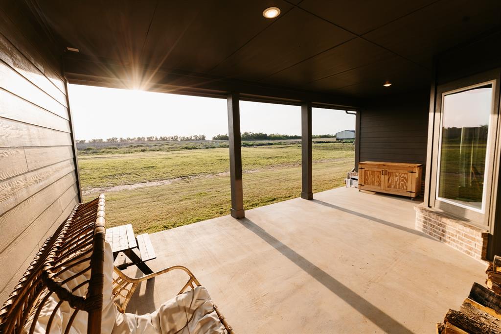 1530 County Road 200 Valley View, TX 76272 - Photo 34 of 34 Spacious covered porch with concrete flooring and recessed lighting