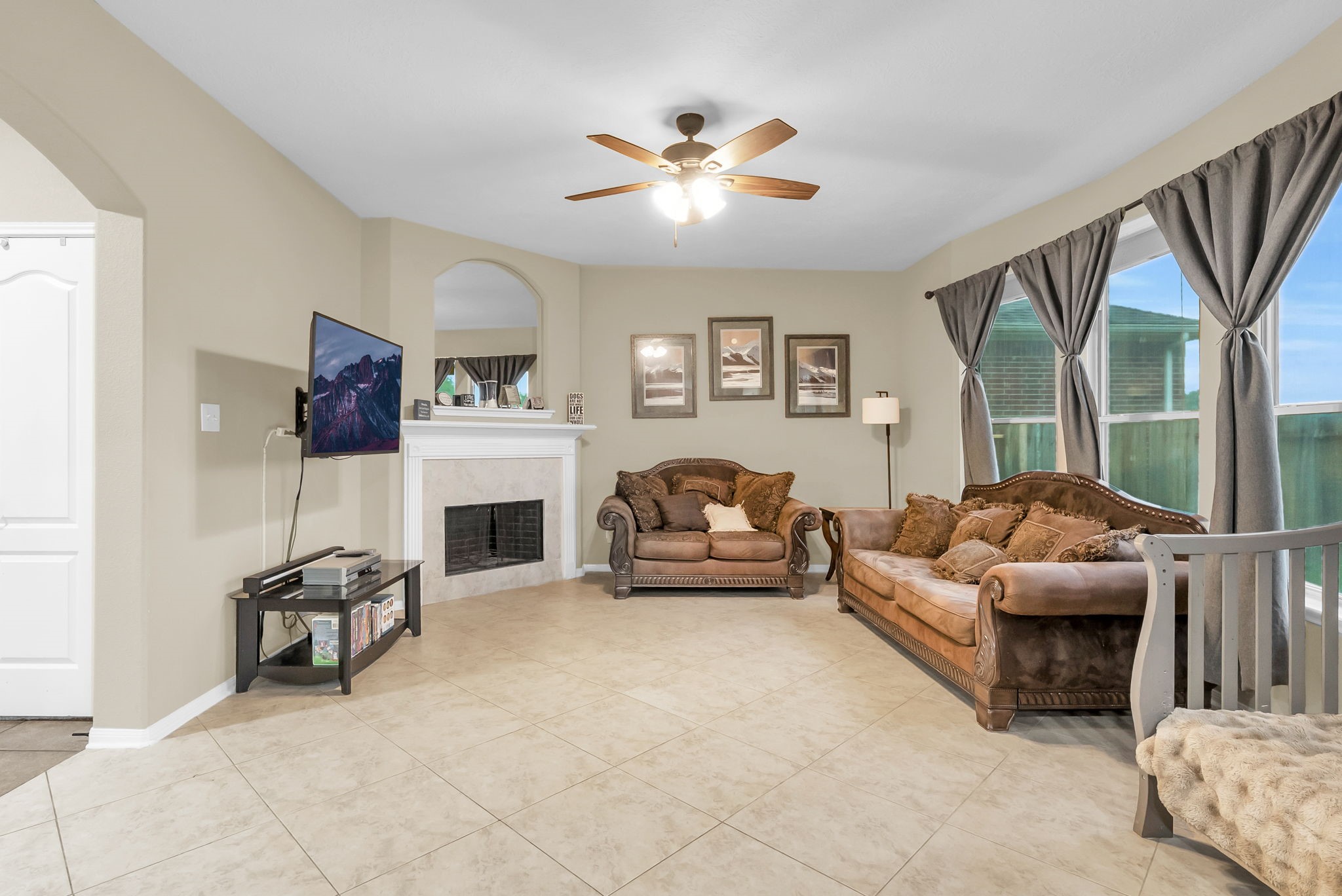 16619 Dover Mills Drive Spring, TX 77379 - Photo 13 of 49 a living room with furniture and a fireplace