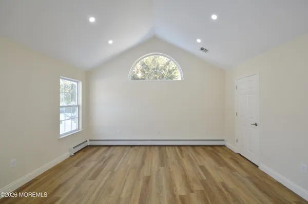 a gym room with lots of gym equipment