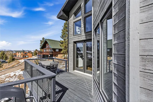 a view of a balcony with chairs