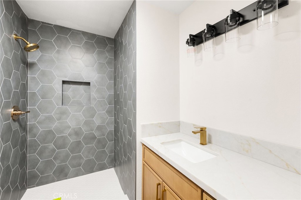 2060 South Grade Road Alpine, CA 91901 - Photo 24 of 69 a bathroom with a sink and a shower