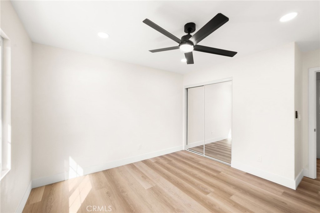 2060 South Grade Road Alpine, CA 91901 - Photo 30 of 69 a view of a big room with wooden floor and closet in a hallway