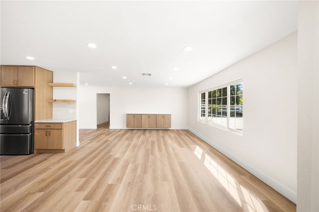 2060 South Grade Road Alpine, CA 91901 - Photo 3 of 69 a view of a kitchen with a sink and refrigerator