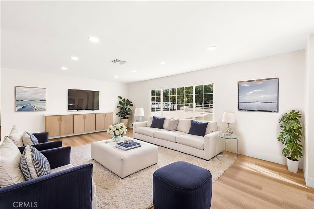 2060 South Grade Road Alpine, CA 91901 - Photo 6 of 69 a living room with furniture and a flat screen tv