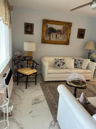 a living room with furniture and a couch