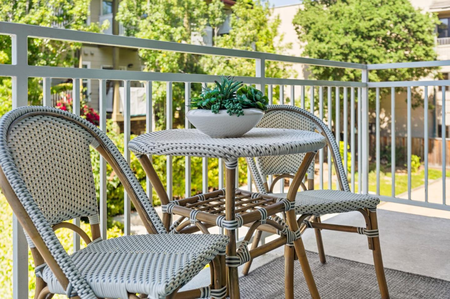 708 Frederick Street, Unit 204 Santa Cruz, CA 95062 - Photo 15 of 28 a view of a balcony with table and chairs