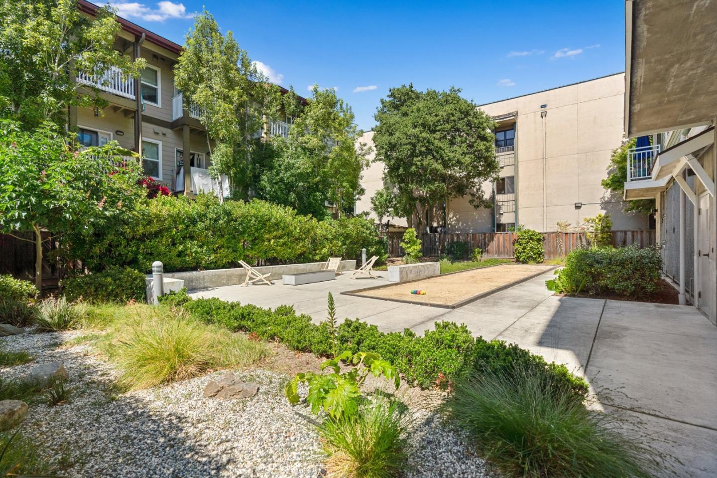 708 Frederick Street, Unit 204 Santa Cruz, CA 95062 - Photo 20 of 28 a view of backyard with a garden and plants