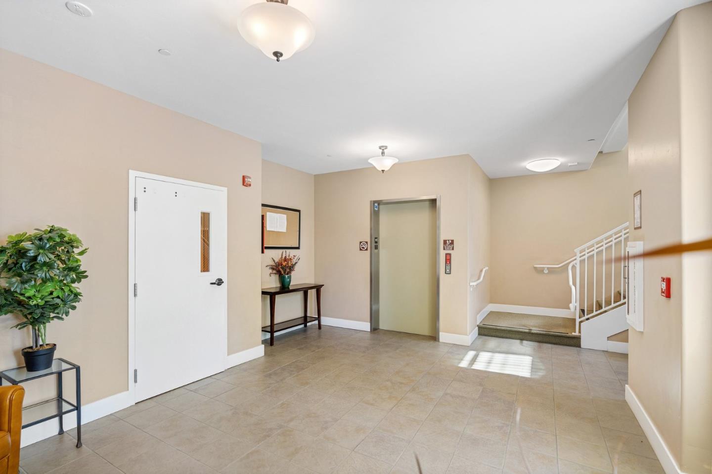 708 Frederick Street, Unit 204 Santa Cruz, CA 95062 - Photo 22 of 28 a view of hallway with livingroom and furniture