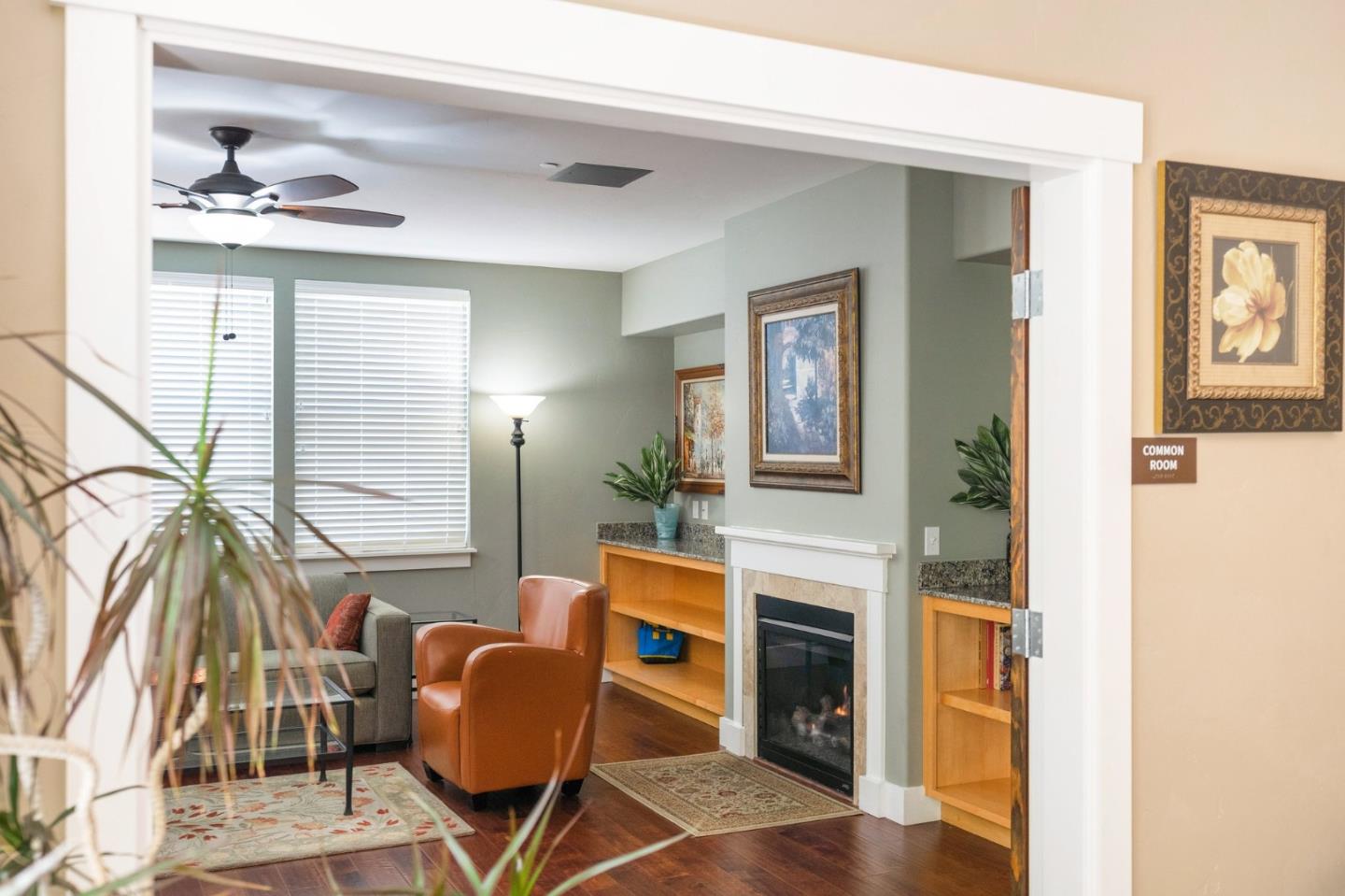708 Frederick Street, Unit 204 Santa Cruz, CA 95062 - Photo 24 of 28 a living room with furniture and a fireplace