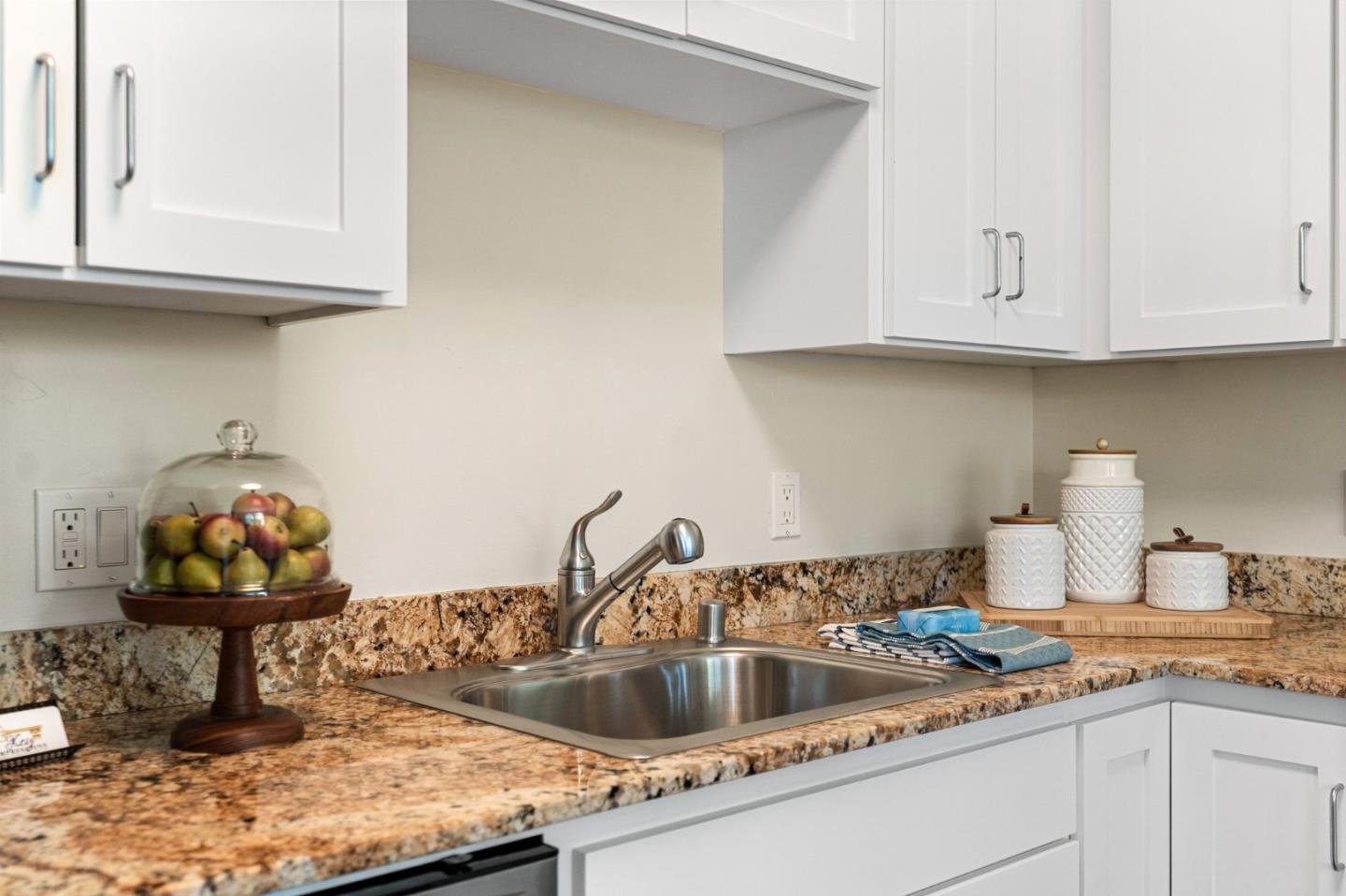 708 Frederick Street, Unit 204 Santa Cruz, CA 95062 - Photo 6 of 28 a kitchen with a sink and cabinets