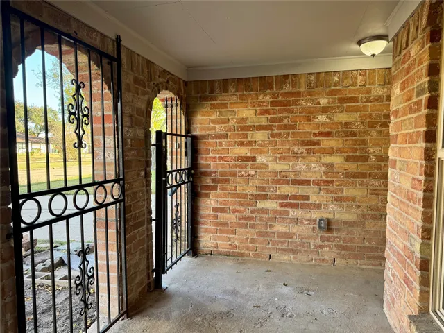wooden floor and window in an empty room