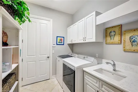 a bathroom with a toilet a sink and a mirror
