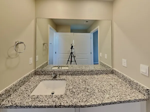 a view of a house with a street