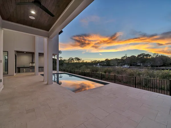 a view of swimming pool with seating