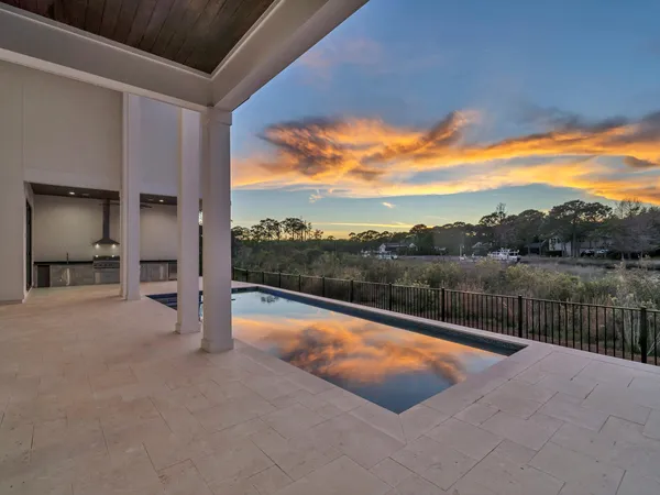 a view of swimming pool with seating
