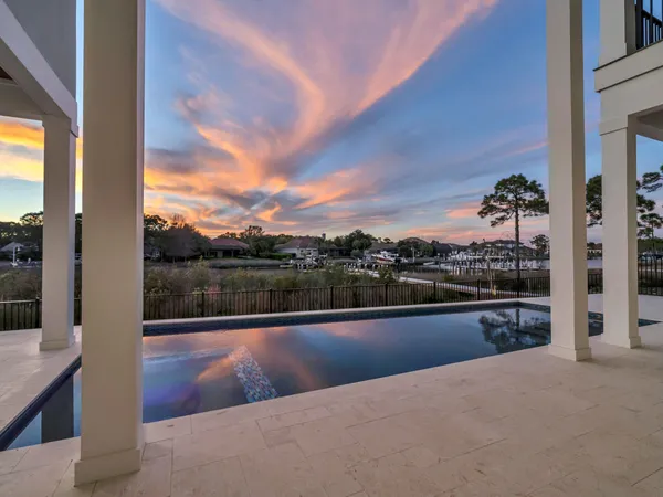 a view of swimming pool with a lake view