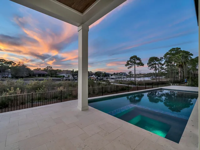 a view of swimming pool with a lake view and mountain view