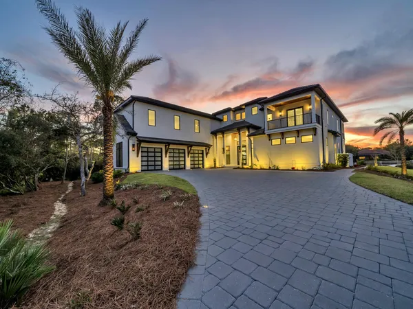 a front view of a house with swimming pool