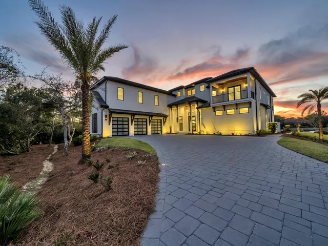 a front view of a house with swimming pool
