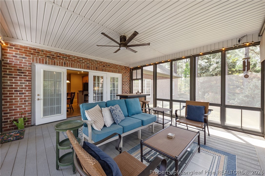 30180 East Lake Road Wagram, NC 28396 - Photo 5 of 42 a living room with furniture and a large window