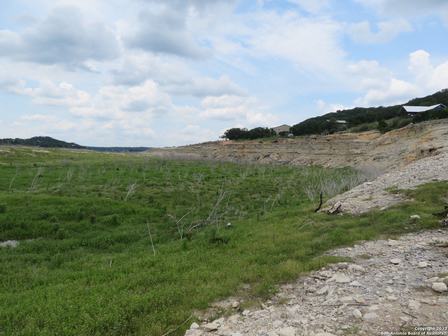 0 Hilltop Loop Lakehills, TX 78063 - Photo 14 of 32 a view of a lush green field