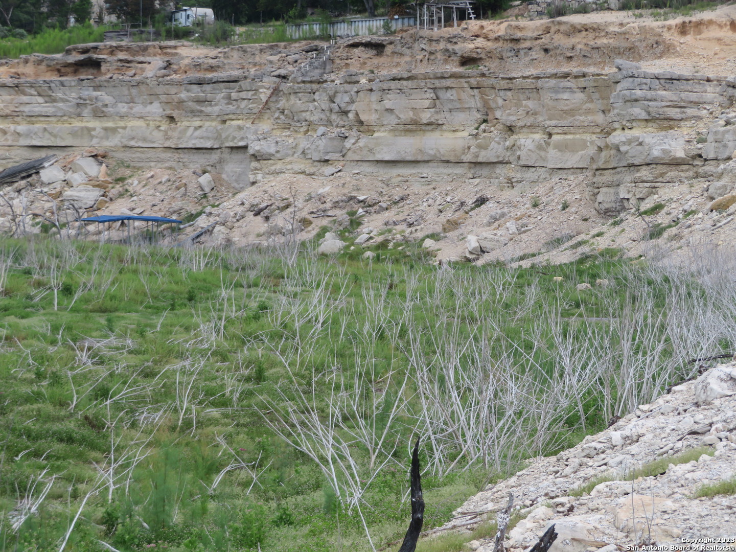0 Hilltop Loop Lakehills, TX 78063 - Photo 29 of 32 a view of a dry yard